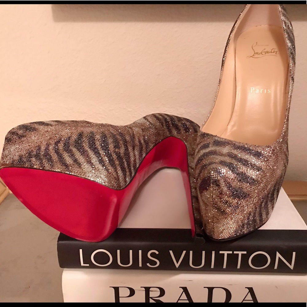 Christian Louboutin zebra red bottoms - worn once